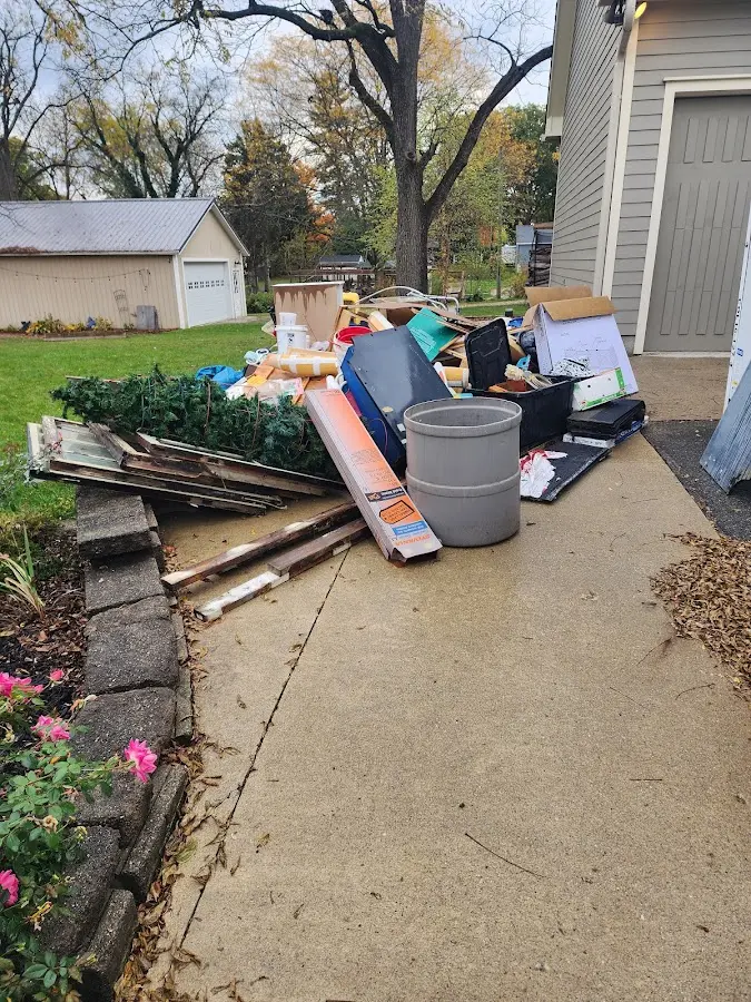 Dumpster being loaded with debris for Roofing Dumpster Rental in Horsham